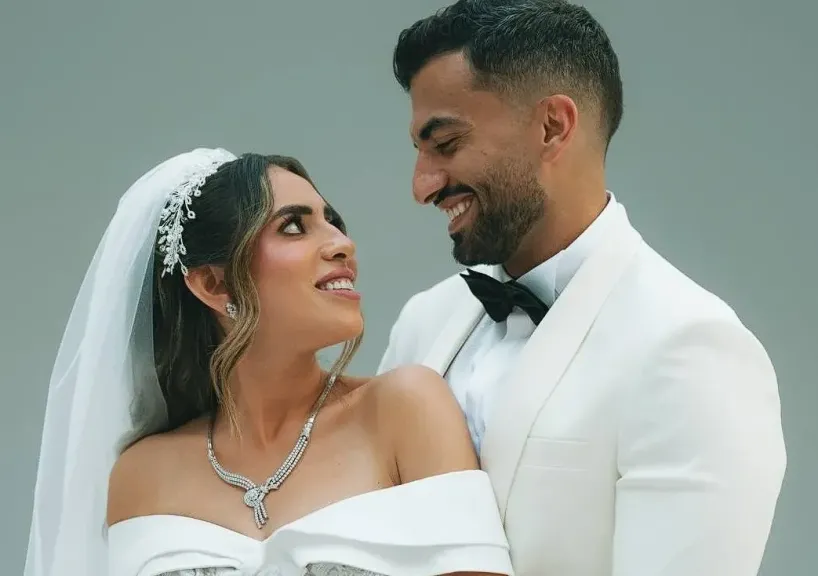 منة عدلي القيعي وزوجها